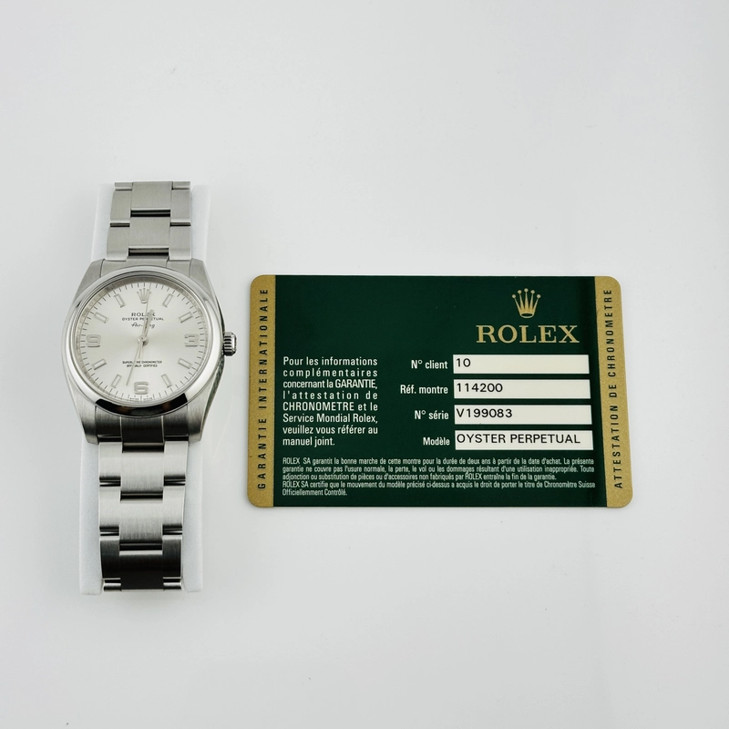 Rolex Oyster Perpetual Silver Stick 369 Dial on Oyster Ref. 114200 Card 2010 view 7