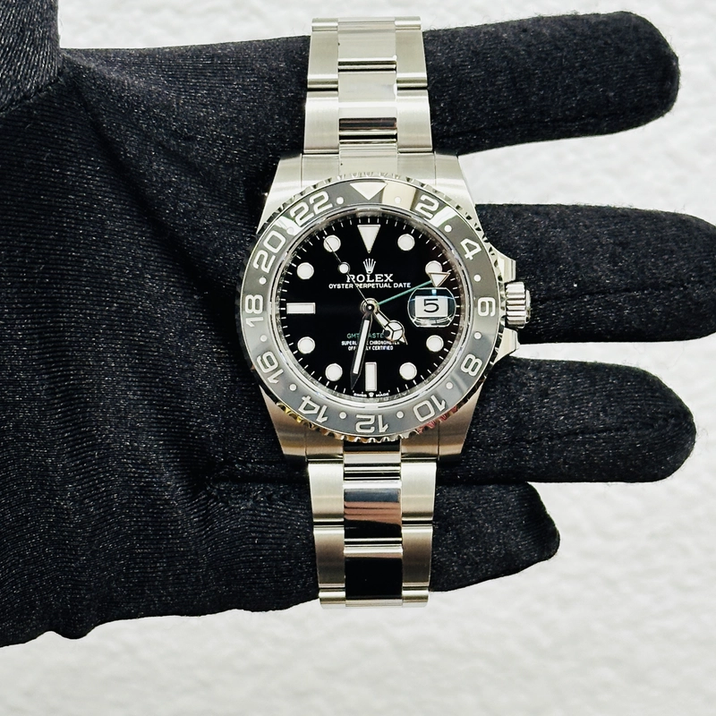 Rolex GMT-Master II BruceWayne Black Dial on Oyster Bracelet Ref. 126710GRNR Card 2026 view 3