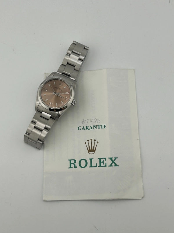 Rolex Oyster Perpetual Salmon / Arabic Numerals Dial on Oyster Bracelet Ref. 67480 Papers 1998 view 8