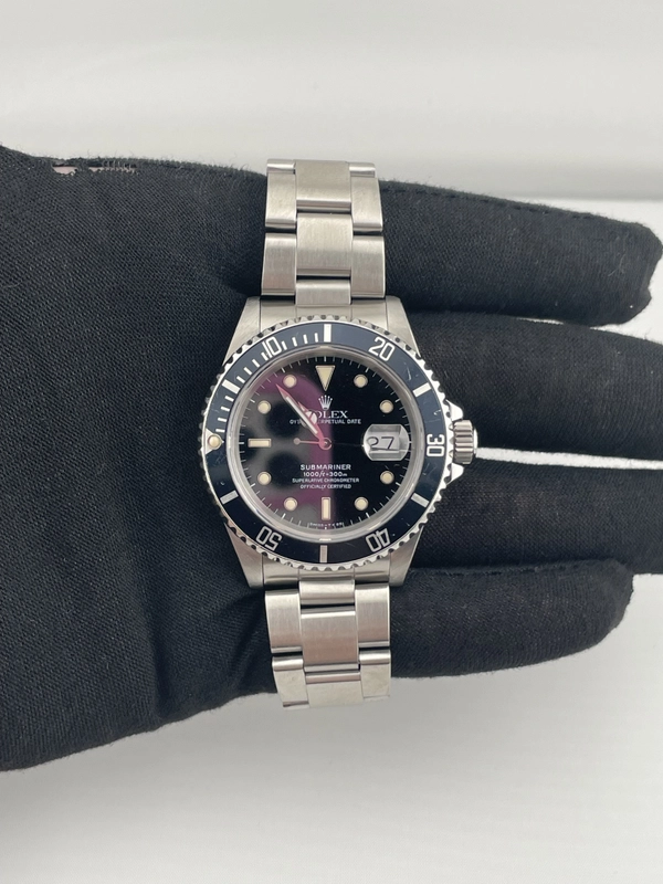 Rolex Submariner Date Black Dial on Oyster Ref. 16610 Papers Open Date view 2