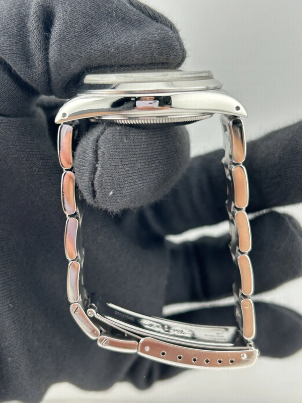 Rolex Oyster Perpetual Date Champagne Dial on Oyster Bracelet Ref. 15000 Papers 1988 view 6