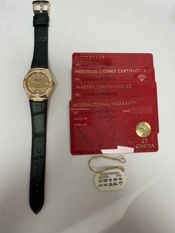 Omega Constellation Co-Axial Champagne Dial on Leather Strap Ref. 131.58.29.20.58.001 Card Open Date view 5