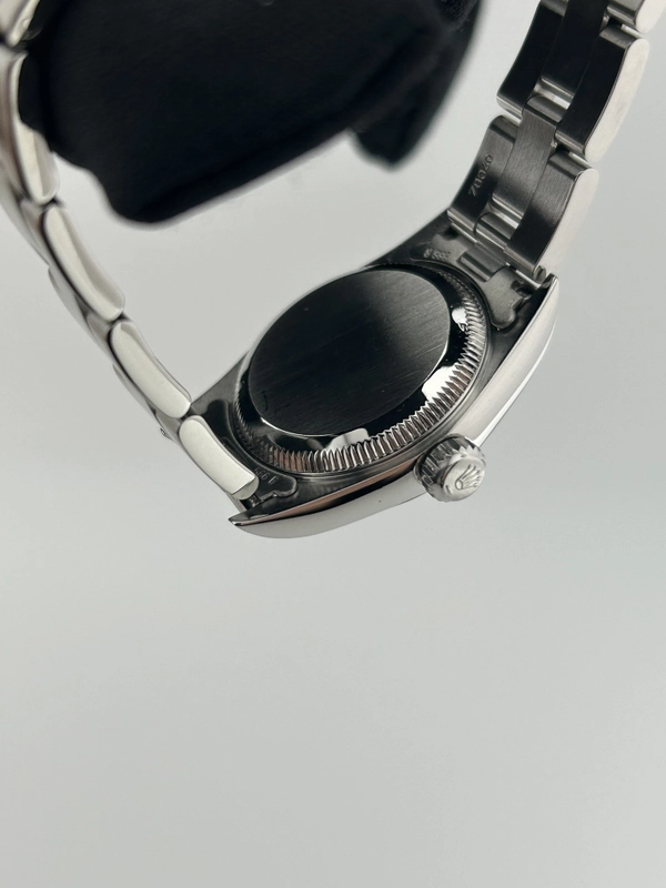 Rolex Oyster Perpetual Black Dial on Oyster Steel Bracelet Ref. 67180 Papers 1997 view 7
