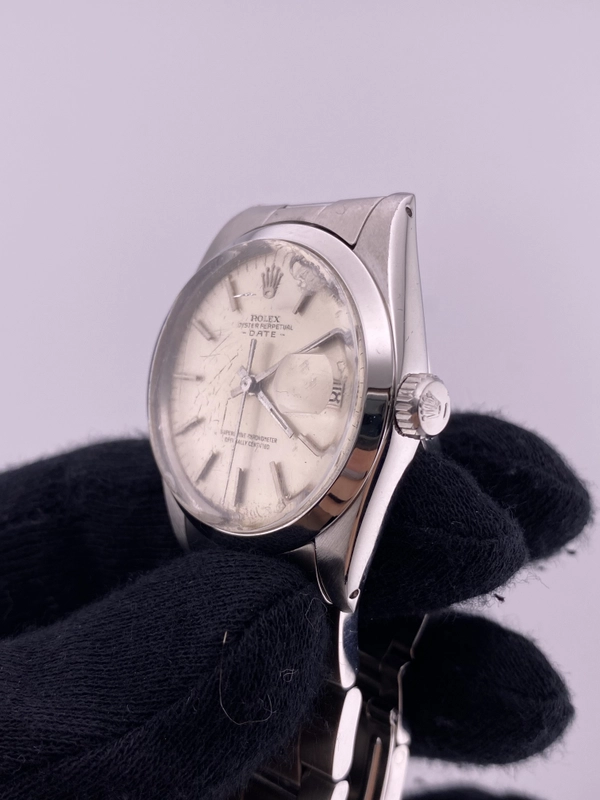 Rolex Oyster Perpetual Date Silver Stick Dial on Oyster Steel Bracelet Ref. 1500 1966 view 3