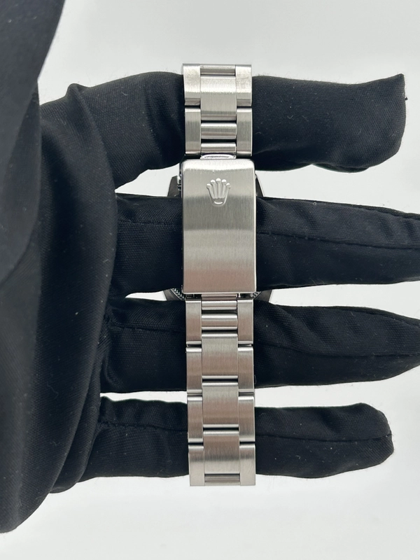 Rolex Oyster Perpetual Salmon / Arabic Numerals Dial on Oyster Bracelet Ref. 67480 Papers 1998 view 4