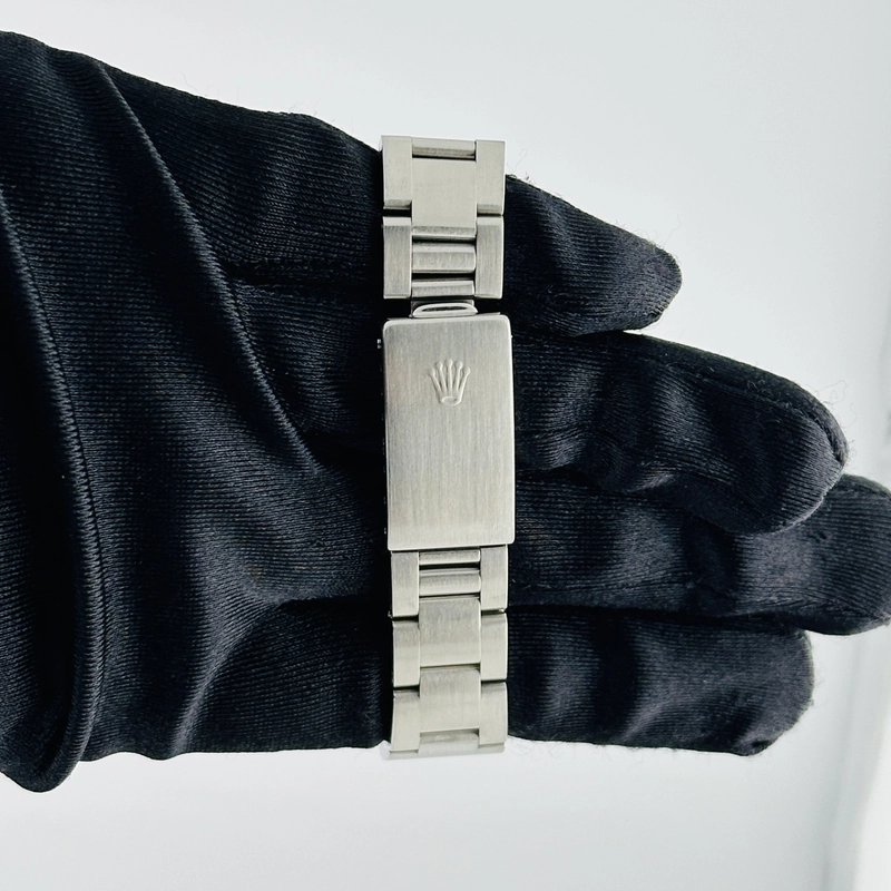Rolex Oyster Perpetual White Roman Dial on Oyster Bracelet Ref. 67480 Papers 1997 view 4