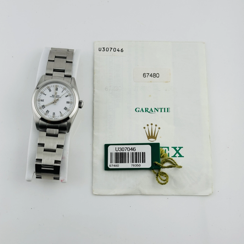 Rolex Oyster Perpetual White Roman Dial on Oyster Bracelet Ref. 67480 Papers 1997 view 7