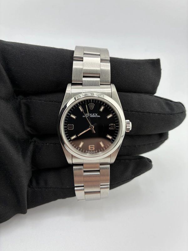 Rolex Oyster Perpetual Black Dial on Oyster Bracelet Ref. 67480 1995 view 3