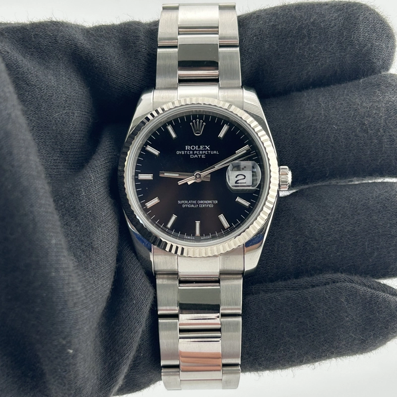 Rolex Oyster Perpetual Date Black Stick Dial on Oyster Ref. 115234
