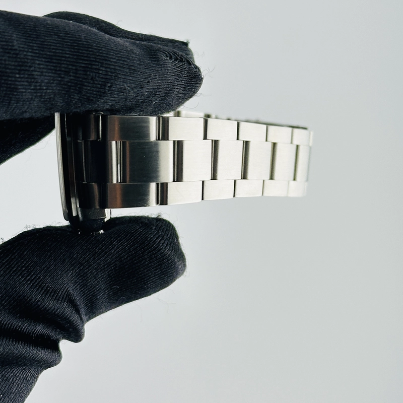Rolex Oyster Perpetual Salmon / Arabic 3,6.9 Dial on Oyster Bracelet Ref. 77080 Papers 2002 view 5