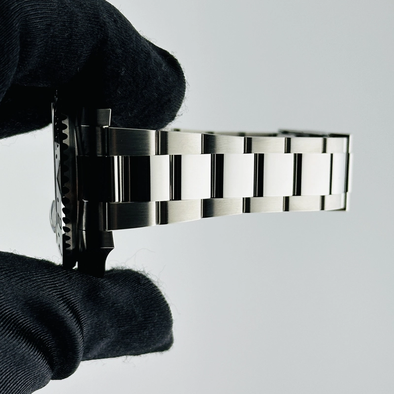 Rolex GMT-Master II BruceWayne Black Dial on Oyster Bracelet Ref. 126710GRNR Card 2026 view 6