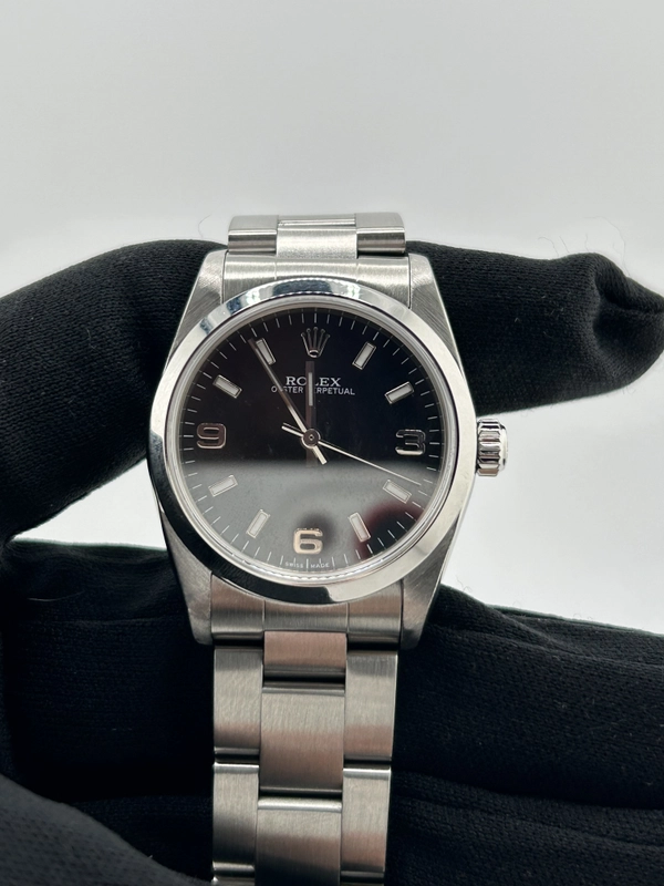 Rolex Oyster Perpetual 31 Black Dial on Stainless Steel Bracelet Ref. 77080 2006 view 3