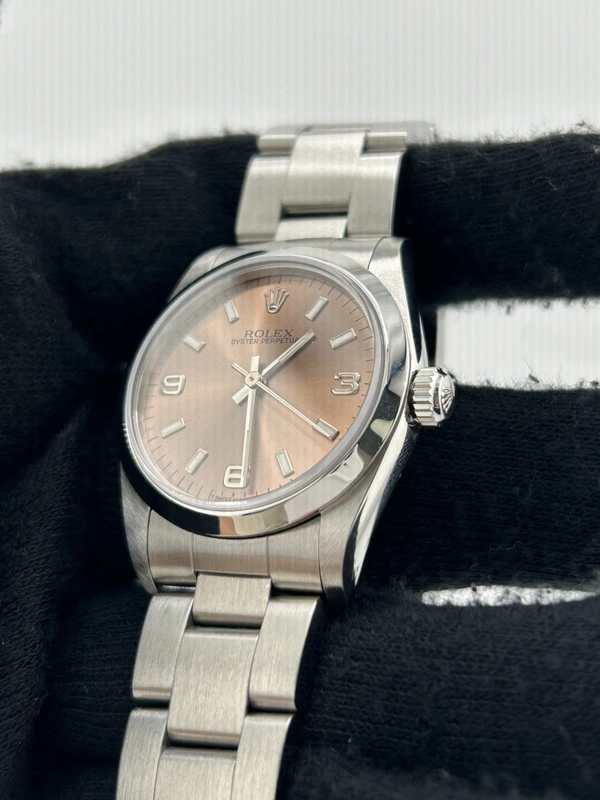 Rolex Oyster Perpetual Salmon Pink Dial on Stainless Steel Bracelet Ref. 67480 1997 view 3