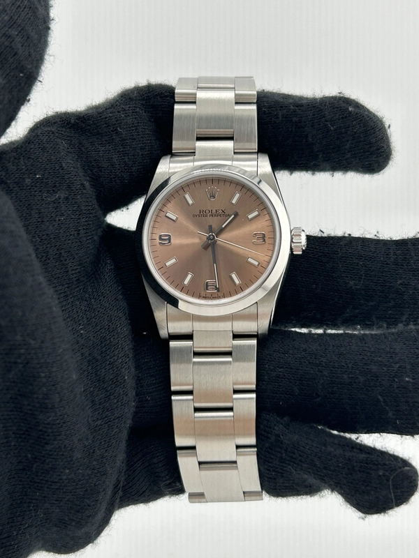 Rolex Oyster Perpetual Salmon Pink Dial on Stainless Steel Bracelet Ref. 67480 1997 view 2