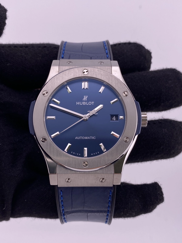 Hublot Classic Fusion Blue Blue Dial on Blue Rubber Ref. 511.NX.7170.LR Complete Open Date view 2