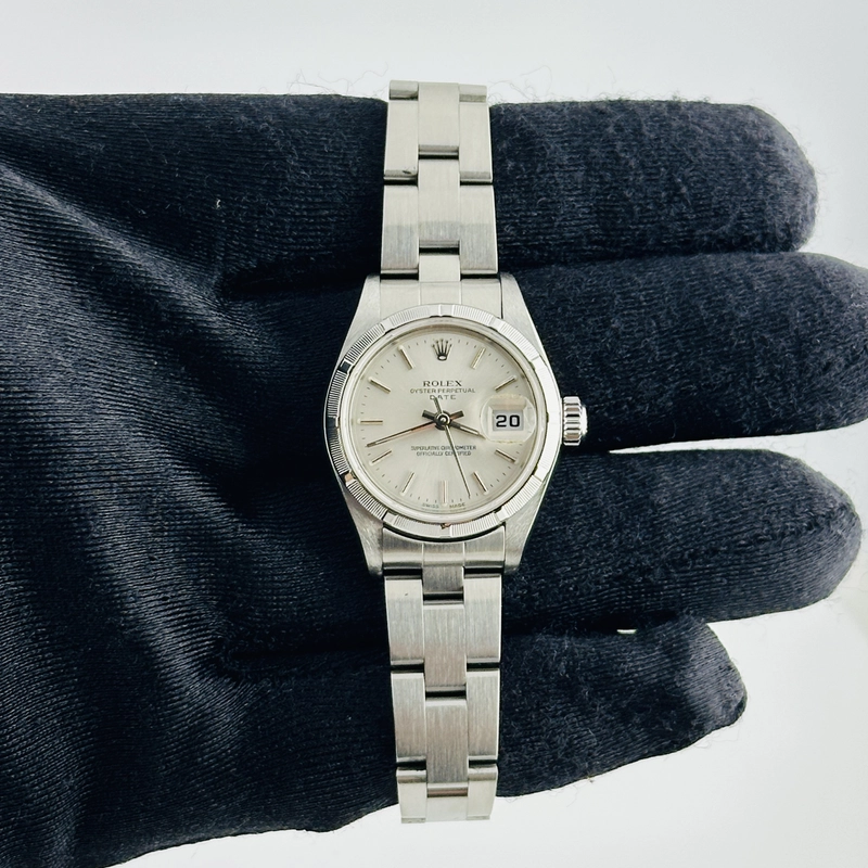 Rolex Oyster Perpetual Date Silver Stick Dial on Oyster Bracelet Ref. 79190 2000