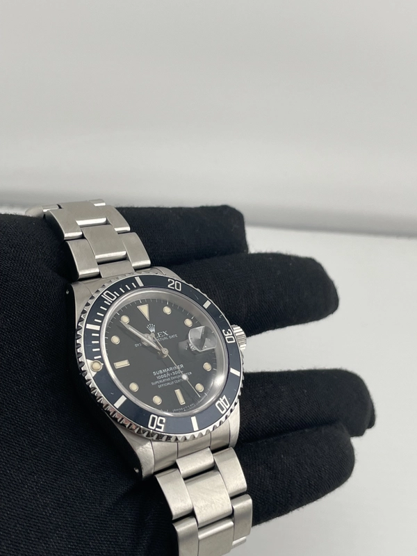 Rolex Submariner Date Black Dial on Oyster Ref. 16610 Papers Open Date view 3