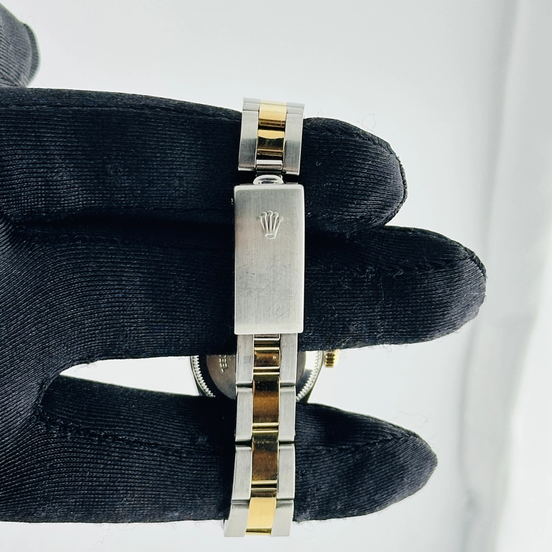 Rolex Oyster Perpetual Am Champagne / Yellow Diamond Markers Dial on Oyster Bracelet Ref. 67193 1990 view 2