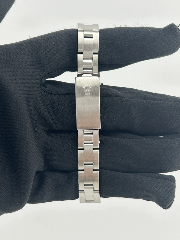 Rolex Oyster Perpetual Black Dial on Oyster Steel Bracelet Ref. 67180 Papers 1997 view 4
