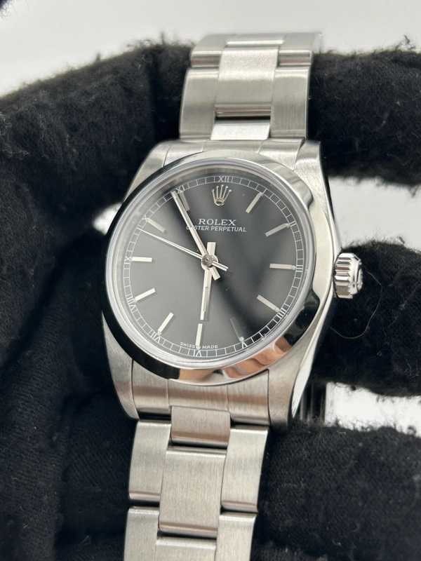 Rolex Oyster Perpetual 31 Black Stick Dial on Stainless Steel Bracelet Ref. 77080 Papers 2006 view 3