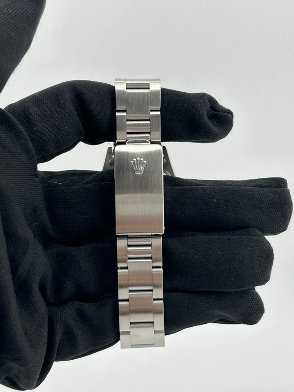 Rolex Oyster Perpetual 31 Black Dial on Stainless Steel Bracelet Ref. 77080 2006 view 4
