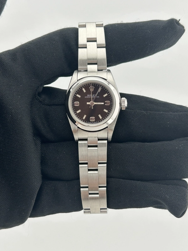 Rolex Oyster Perpetual Black Dial on Oyster Steel Bracelet Ref. 67180 Papers 1997 view 2