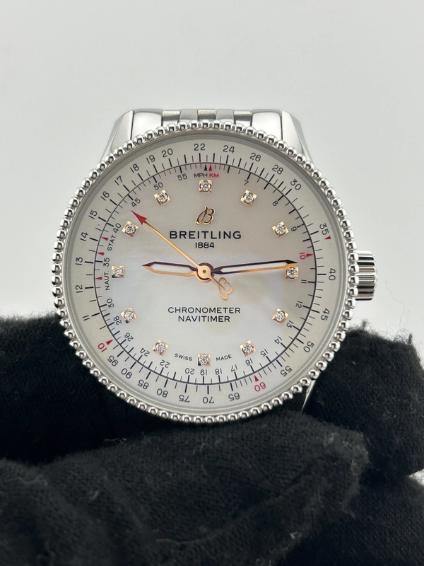 Breitling Navitimer Automatic White Mop Dial on Stainless Steel Bracelet Ref. A17395211A1A1 Complete view 3