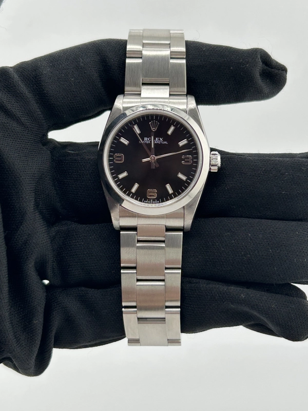 Rolex Oyster Perpetual 31 Black Dial on Stainless Steel Bracelet Ref. 77080 2006 view 2