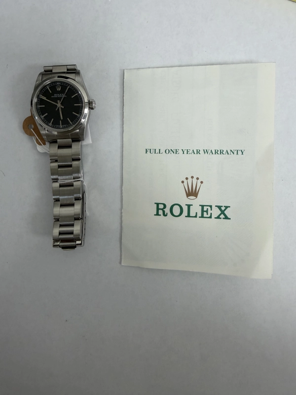 Rolex Oyster Perpetual Black Dial on Oyster Ref. 67480 Papers 1999 view 5