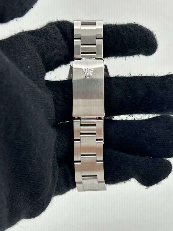 Rolex Oyster Perpetual Salmon Pink Dial on Stainless Steel Bracelet Ref. 67480 1997 view 4