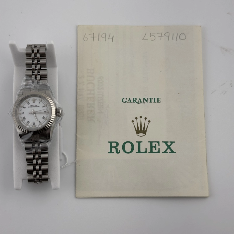 Rolex Oyster Perpetual White Roman Dial on Jubilee Ref. 67194 Papers 1990 view 4