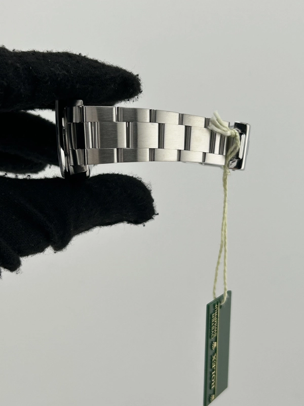 Rolex Oyster Perpetual 31 Black Stick Dial on Stainless Steel Bracelet Ref. 77080 Papers 2006 view 5