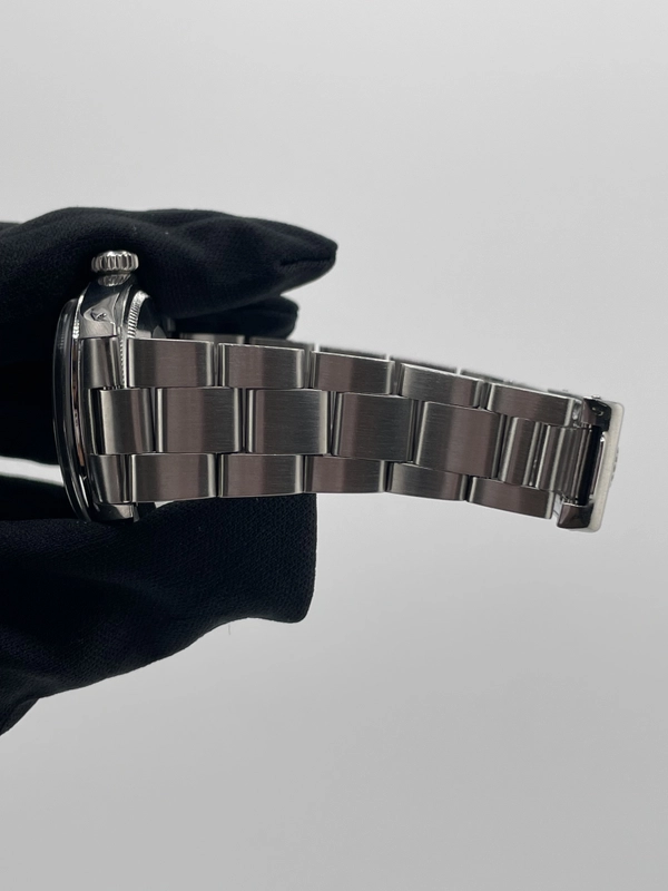 Rolex Oyster Perpetual Date Black Stick Dial on Oyster Steel Bracelet Ref. 1500 1969 view 5