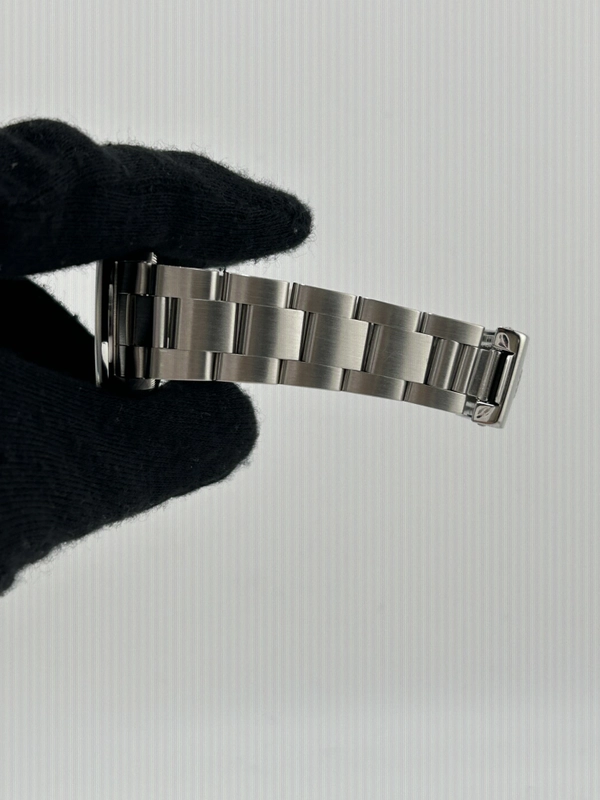 Rolex Oyster Perpetual Salmon Pink Dial on Stainless Steel Bracelet Ref. 67480 1997 view 5