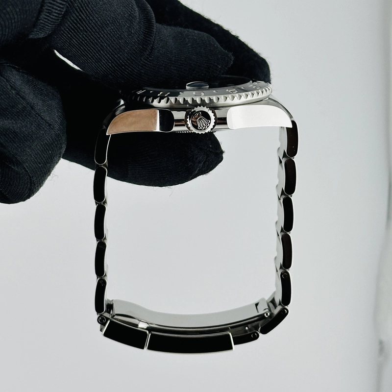 Rolex GMT-Master II BruceWayne Black Dial on Oyster Bracelet Ref. 126710GRNR Card 2026 view 7