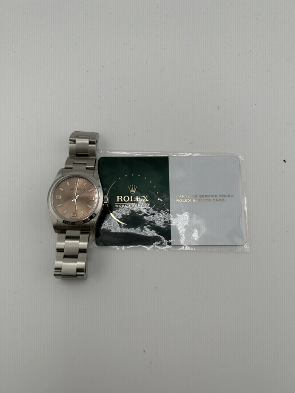 Rolex Oyster Perpetual Salmon Pink Dial on Stainless Steel Bracelet Ref. 67480 1997 view 7