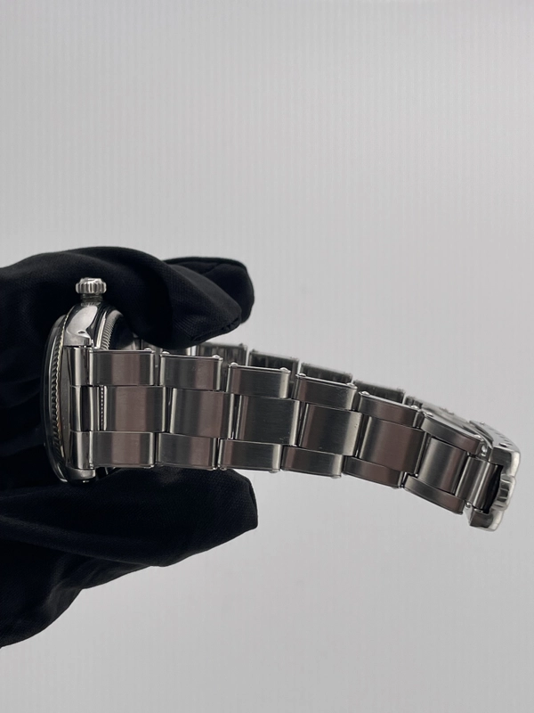 Rolex Oyster Perpetual Silver Dial on Oyster Bracelet Ref. 6567 1974 view 4