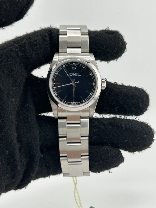 Rolex Oyster Perpetual 31 Black Stick Dial on Stainless Steel Bracelet Ref. 77080 Papers 2006 view 2
