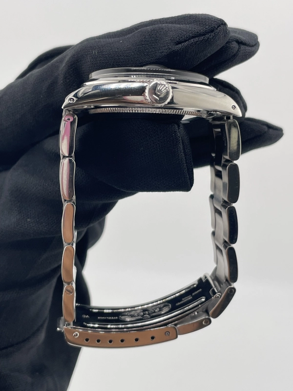 Rolex Oyster Perpetual Date Black Stick Dial on Oyster Steel Bracelet Ref. 1500 1969 view 6